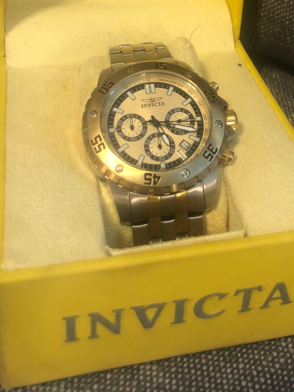Invicta gold and silver watch